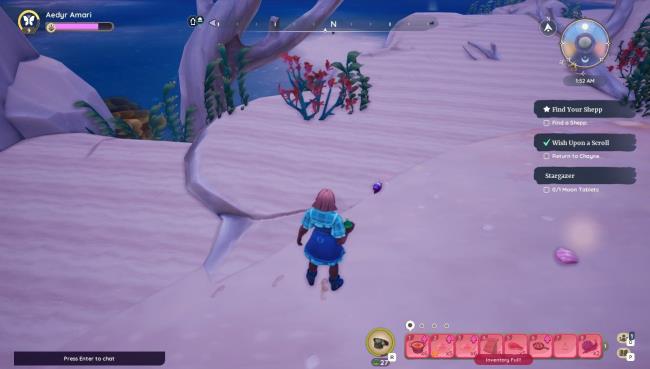 Player character with smoke bomb in hand standing next to a wild Stripeshell Snail on the Bahari Bay coat in Palia.